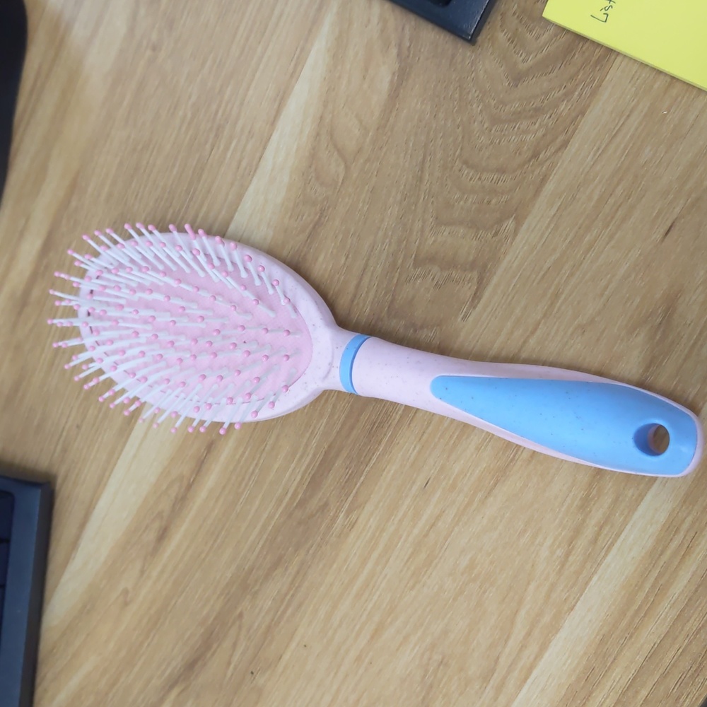 pink detangling hair comb